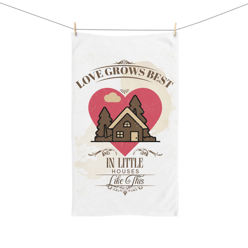 Love Grows Best in Little Houses Hand Towel